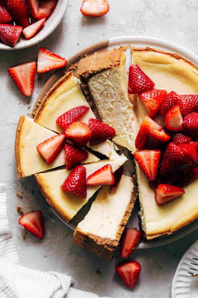 The best classic cheesecake topped with fresh strawberries.