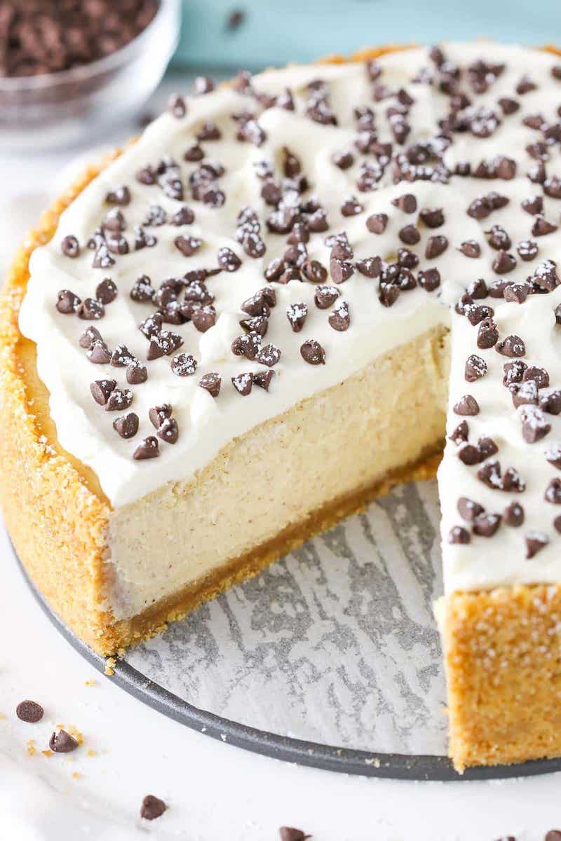 Cannoli cheesecake made with ricotta, mascarpone, and mini chocolate chips.
