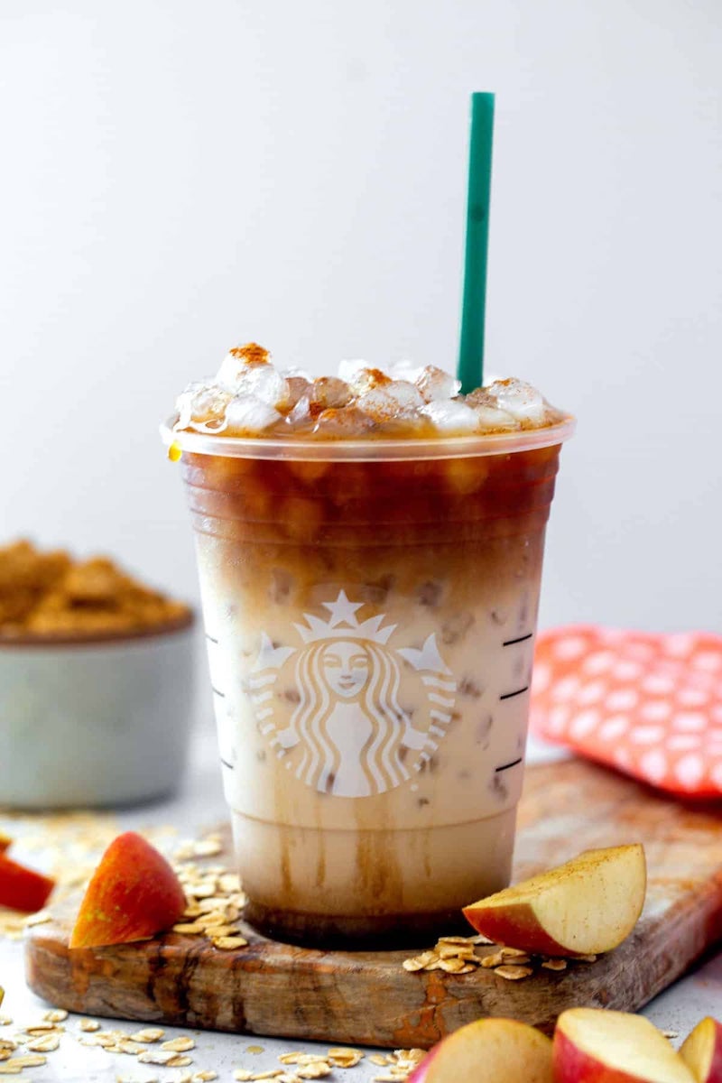 Starbucks copycat iced apple crisp oatmilk macchiato made with espresso, oat milk, and apple brown sugar syrup.