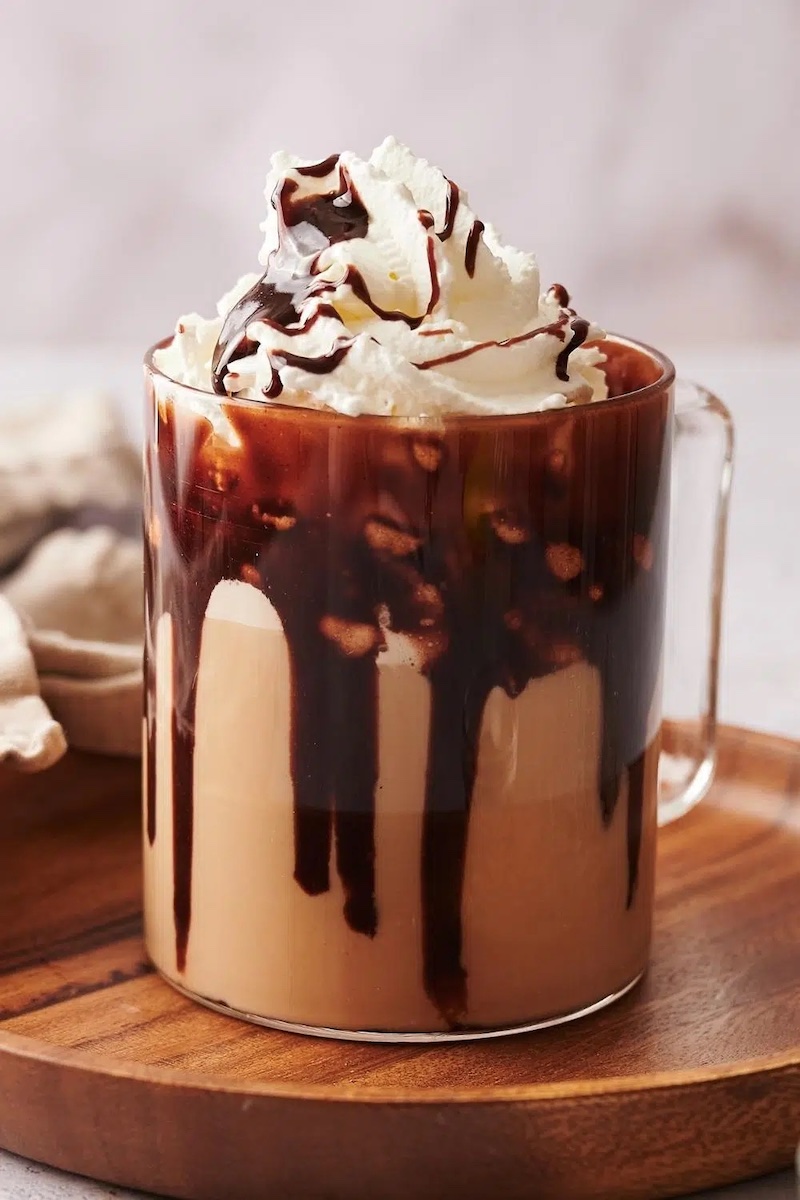 Starbucks copycat caffè mocha topped with whipped cream and chocolate sauce.